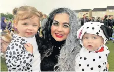  ??  ?? Flashback Mum Linzi Carmichael with two little dalmations Frankie and Georgie Mccluskie enjoyed all the fun of the gala last year