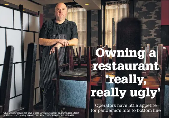  ??  ?? Chef Craig Flinn at his Two Doors Down restaurant on Barrington Street in Halifax on Tuesday. RYAN TAPLIN • THE CHRONICLE HERALD