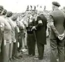  ??  ?? King Edward VIII greets troops at the unveiling of the Vimy memorial.