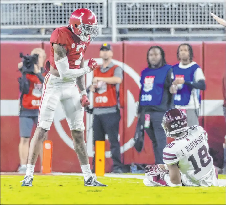  ?? Vasha Hunt
The Associated Press ?? Alabama cornerback Eli Ricks enjoyed the Crimson Tide’s 30-6 home win Saturday against Mississipp­i State and receiver Justin Robinson, as did bettors.