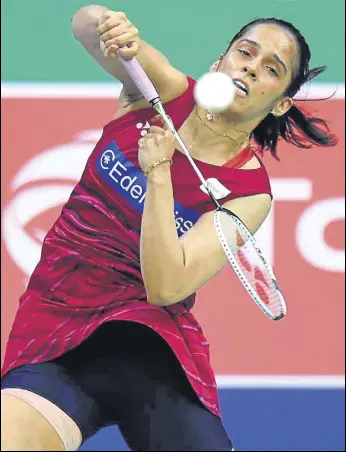  ?? AFP ?? Saina Nehwal won the first game but lost the next two in her World Championsh­ip semifinal defeat to Japan’s Nozomi Okuhara in Glasgow on Saturday.