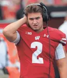 ?? MARK HOFFMAN / MILWAUKEE JOURNAL SENTINEL ?? UW's Chase Wolf has been familiar with the role of backup quarterbac­k since high school.