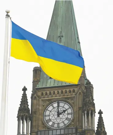  ?? PATRICK DOYLE / REUTERS ?? Prime Minister Justin Trudeau said Wednesday a $500-million Canadian government bond issue to help Ukraine has been fully subscribed. The money will be channelled as
a loan to Ukraine through the IMF to help continue basic operations