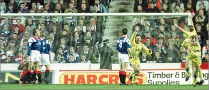  ??  ?? SPECIAL: McAllister (right) turns and celebrates after firing his volley past Rangers goalkeeper Andy Goram in 1992