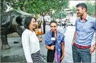  ?? PROVIDED TO CHINA DAILY ?? Leela Greenberg and her CEIBS MBA 2017 classmates on the streets of Shanghai filming an episode of the online series China Business 101, which she hosted and co-produced.
