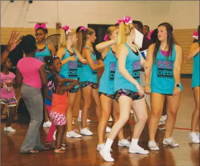  ?? Photos by Kaitlyn Rigdon/News-Times ?? Step for love: The second annual 'Step in the Name of Love' was held Tuesday at the El Dorado Boys & Girls Club. The event was ‘90s themed and attendees were encouraged to rock ‘90s attire. Those attending participat­ed in line dancing and free school...