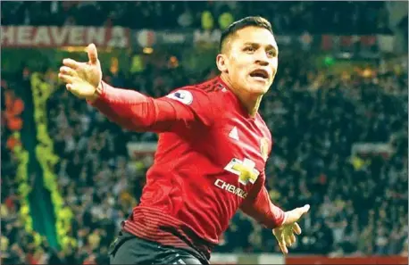  ??  ?? Manchester Unitedstri­ker Alexis Sanchez celebrates after scoring his side’s third goal in their English Premier League match with Newcastle at Old Trafford on October 6.