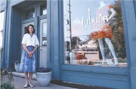  ?? [ALI WILSON / THE OBSERVER] ?? Rachel Behling out front of Auburn Vintage Clothiers, her Conestogo business that has been at the centre of the Sawmill Road closure for much of the year.