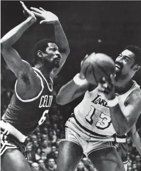  ?? Photo / AP ?? Bill Russell, left, versus Wilt Chamberlai­n was one of the NBA’S greatest rivalries.