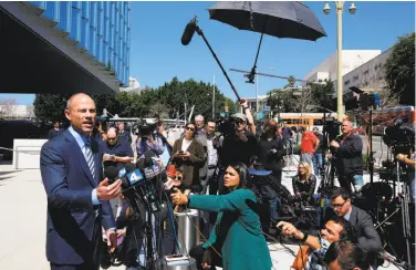  ?? Damian Dovarganes / Associated Press ?? Stormy Daniels’ attorney, Michael Avenatti, addresses reporters outside federal court in Los Angeles.