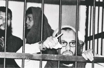  ?? GETTY IMAGES ?? ABOVE: Zawahiri is seen in Egypt in 1982, while he was on trial after the assassinat­ion of Egyptian President Anwar Sadat the previous year.
