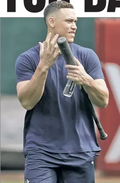  ?? AP ?? GOOD SIGN: Aaron Judge, doing light work during the A’s series, performed some light hitting drills before Friday’s game vs. the Mariners.