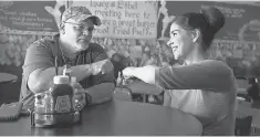  ??  ?? Silverman and Danny D. Cruchelow have a meeting of the minds —and fists — at East Texas Burger in Mineola.