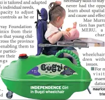  ??  ?? INDEPENDEN­CE Girl in Bugzi wheelchair