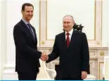  ?? — AFP ?? MOSCOW: Russian President Vladimir Putin meets his Syrian counterpar­t Bashar Al-Assad at the Kremlin on March 15, 2023.