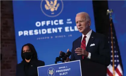  ?? Photograph: Alex Wong/Getty Images ?? Joe Biden discusses his coronaviru­s relief plan in Wilmington on Friday.