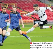  ?? MARTIN SWINNEY ?? ■ Star man Luke Molyneux of Gateshead shoots at the Bromley goal