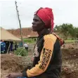  ?? | AP ?? Mary Zindege waits for news of her son who is missing after 24 miners died after rains flooded the mines while they were undergroun­d in Kadoma town about 200km west of Harare.