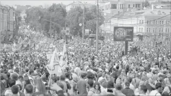  ??  ?? OPPOSITION activists rally in Moscow yesterday against President Vladimir Putin’s third term. — AFP