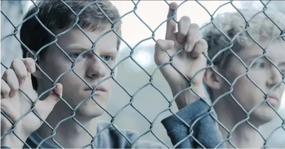  ?? PHOTOS: UNIVERSAL PICTURES ?? Lucas Hedges, left, and Troye Sivan star in Boy Erased, based on a true story about a young man who’s sent to gay conversion therapy.