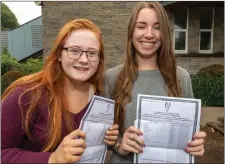  ?? Photo by John Delea ?? A ‘shocked’ Kate Brady and a ‘very happy’ Lydia Costello with their results at St Mary’s in Macroom.