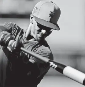  ?? RICH STORRY/USA TODAY SPORTS ?? Mets shortstop Francisco Lindor warms ups prior to a game against the Cardinals on March 19 at Clover Park in Port St. Lucie, Fla.