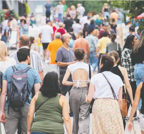  ?? GRAHAM HUGHES / THE CANADIAN PRESS ?? In parts of Quebec such as Old Montreal, above, capacity restrictio­ns in retail locations have been lifted since July 12.