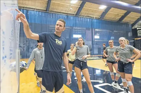  ?? Steph Chambers/Post-Gazette ?? Coach Dan Fisher’s Pitt women’s volleyball team has been the exception to the struggling rule since joining the ACC.