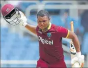  ?? AP ?? West Indies' Evin Lewis celebrates after scoring a century against India during their T20I at Sabina Park on Sunday.