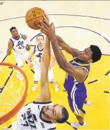  ?? Carlos Avila Gonzalez / The Chronicle ?? After two NBA seasons largely spent in the developmen­t league, Damian Jones (right) is showing flashes of potential.