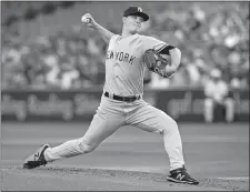  ?? FRED THORNHILL/THE CANADIAN PRESS/AP PHOTO ?? Yankees starting pitcher Sonny Gray throws in the first inning of Friday’s game against the Blue Jays at Toronto.