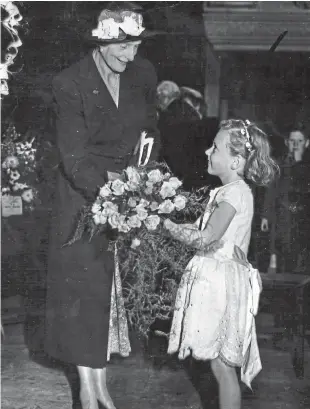  ??  ?? When Lady Cayzer of Kinpurnie Castle opened Dundee Flower Show in the Caird Hall in August, 1949, she was presented with a bouquet by Diana Scarlett.