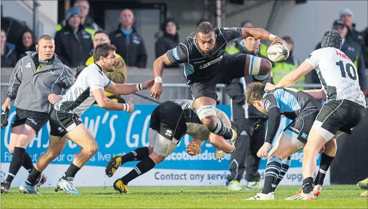  ?? Picture: SNS ?? LEAP OF FAITH: The departing Leone Nakarawa hurdles through the Zebre resistance on a night when Glasgow Warriors were at their brilliant best to ensure a chance at a home play-off semi-final.