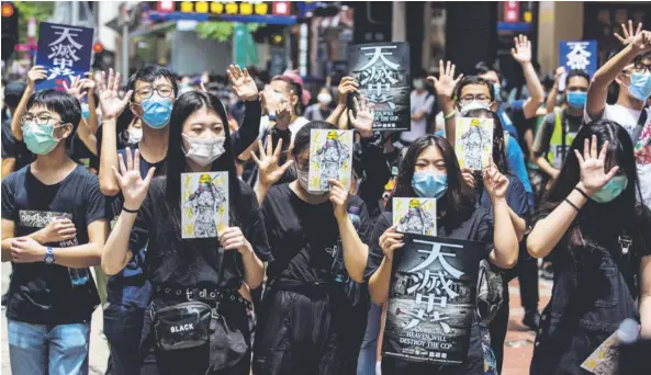  ?? aFP ?? Protestas contra la ley de seguridad, en Causeway Bay, Hong Kong, el 24 de mayo del 2020.