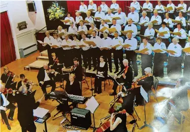  ?? ?? Helensburg­h Dorian Choir in 1982, with James Mactaggart conducting. Image: Contribute­d