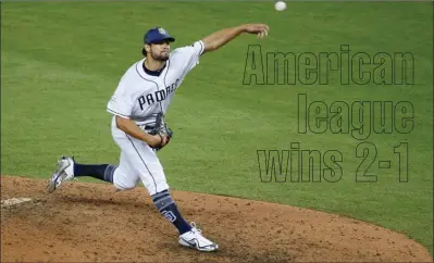  ?? The Associated Press ?? National League’s San Diego Padres pitcher Brad Hand delivers a pitch, during the MLB baseball All-Star Game Tuesday in Miami.