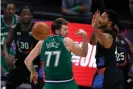  ??  ?? The Mavericks’ Luka Dončić flicks a behind-the-back pass during an April game against the New York Knicks. Photograph: Tom Pennington/Getty Images