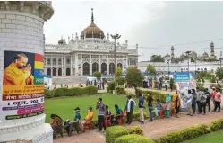  ?? — PTI ?? People in large number arrive to receive a dose of Covid vaccine at the Chota Imambara mega vaccinatio­n centre in Lucknow on Tuesday.