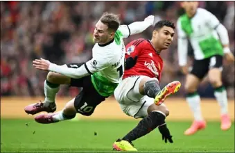  ?? Photo: AFP ?? Liverpool’s Alexis Mac Allister (left) clashes with Manchester United’s Casemiro during the 2-2 draw at Old Trafford last Sunday (Apr 7).