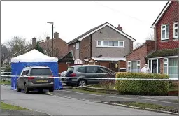  ??  ?? Forensics officers at the scene of the killings on New Year’s Day