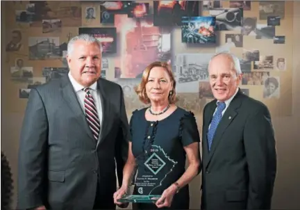  ?? SUBMITTED PHOTO ?? Claudia Hellebush, president and CEO of the United Way of Chester County, center, was inducted into the Chester County Business Hall of Fame Thursday during the Chester County Economic Developmen­t Council’s Business Achievemen­t Award Dinner at the...