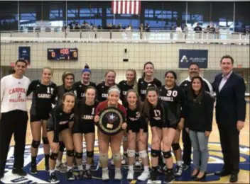  ?? SUBMITTED PHOTO ?? Archbishop Carroll’s volleyball team poses after winning its third straight Catholic League championsh­ip with a 3-0 win over Cardinal O’Hara.