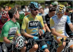  ?? PHOTO: GETTY IMAGES ?? Team Novo Nordisk rider Charles Planet, right, with fellow Tour of California classifica­tion jersey wearers Mark Cavendish, left, and Bradley Wiggins.