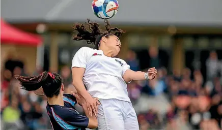  ?? PHOTO: PHILLIP ROLLO ?? MAGS centre-back Caitlin Pritchard headers the ball during the final of the NZSS football champs.