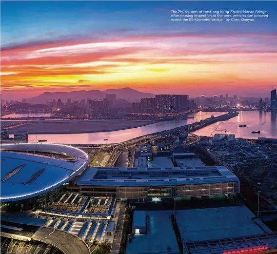  ??  ?? The Zhuhai port of the Hong Kong-zhuhai-macao Bridge. After passing inspection at the port, vehicles can proceed across the 55-kilometer bridge. by Chen Xianyao