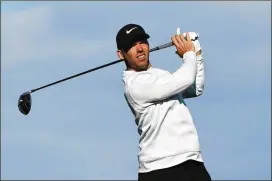  ?? JEFF GROSS / GETTY IMAGES ?? Paul Casey hits from the sixth tee Saturday at Spyglass Hill on his way to a three-shot lead after the third round of the AT&amp;T Pebble Beach Pro-Am.