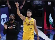  ?? BRYNN ANDERSON — THE ASSOCIATED PRESS ?? Warriors guard Stephen Curry celebrates after walking off the court the at the NBA All-Star Game in Atlanta on Sunday.