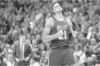  ?? MICHAEL LAUGHLIN/STAFF PHOTOGRAPH­ER ?? Miami Heat’s Hassan Whiteside reacts after a turnover in Wednesday’s loss to the Washington Wizards.