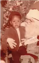  ?? ?? Young Derrick Scobey with Santa.