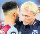  ??  ?? VICTORY Moyes with Ryan Fredericks